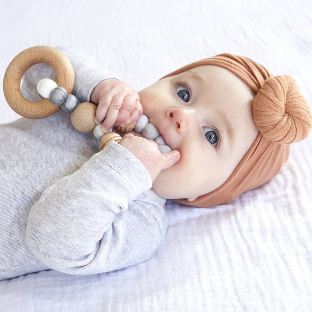 Gorgeous baby chewing silicone and wood teething toy