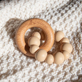 Handmade teething toy for babies, made from non-toxic silicone and beech wood. Beige/Taupe. Made in Australia by Bowerbird Creations.