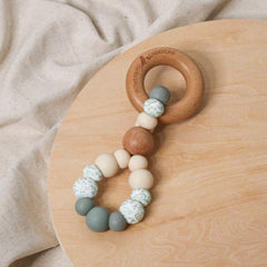 Teething toy infinity. Handmade from silicone and beech wood by Bowerbird Creations. Made in Australia. Beige, Sage, Eucalyptus.