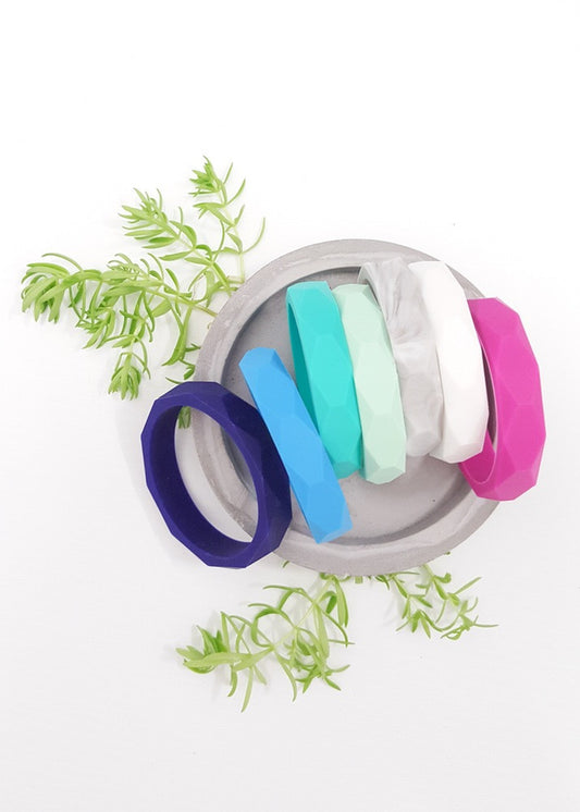 Geometric silicone bangles for mum. Blue, white, marble and pink. Non-toxic silicone makes a great chew toy for baby.