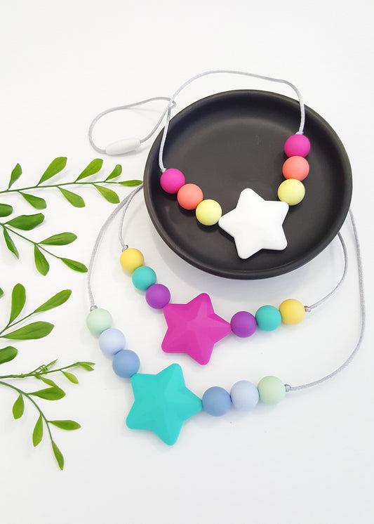 Childrens silicone star necklace. Pink, white, blue, turquoise, purple, yellow and mint.