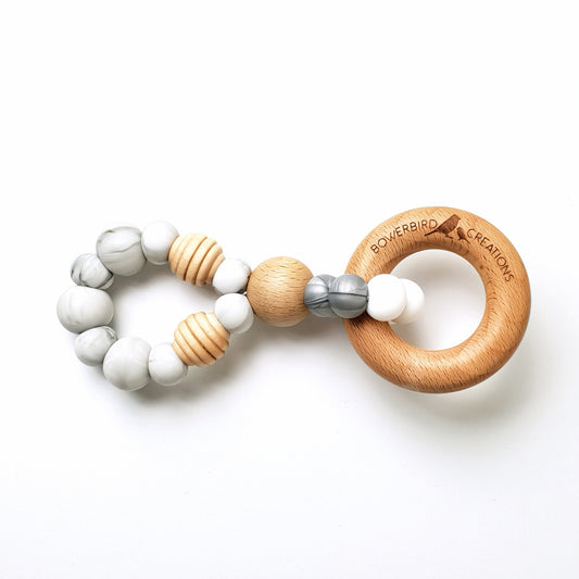 Infinity teething toy in silver marble. Teether made from BPA-free silicone and natural beechwood timber teething ring. Wooden and silicone beads. 