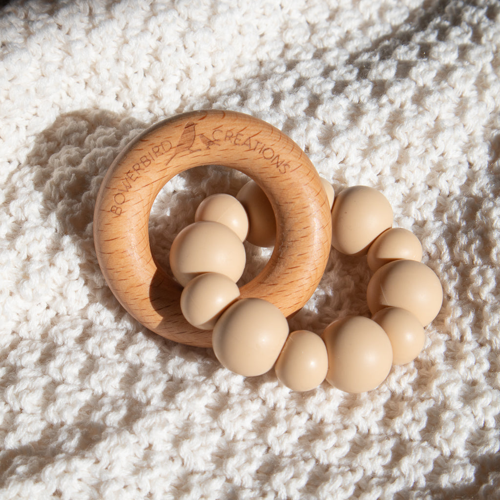 Handmade teething toy for babies, made from non-toxic silicone and beech wood. Beige/Taupe. Made in Australia by Bowerbird Creations. 