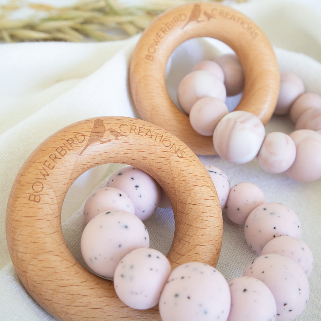 Handmade teething toy for babies, made from non-toxic silicone and beech wood. Pink Granite. Made in Australia by Bowerbird Creations. 