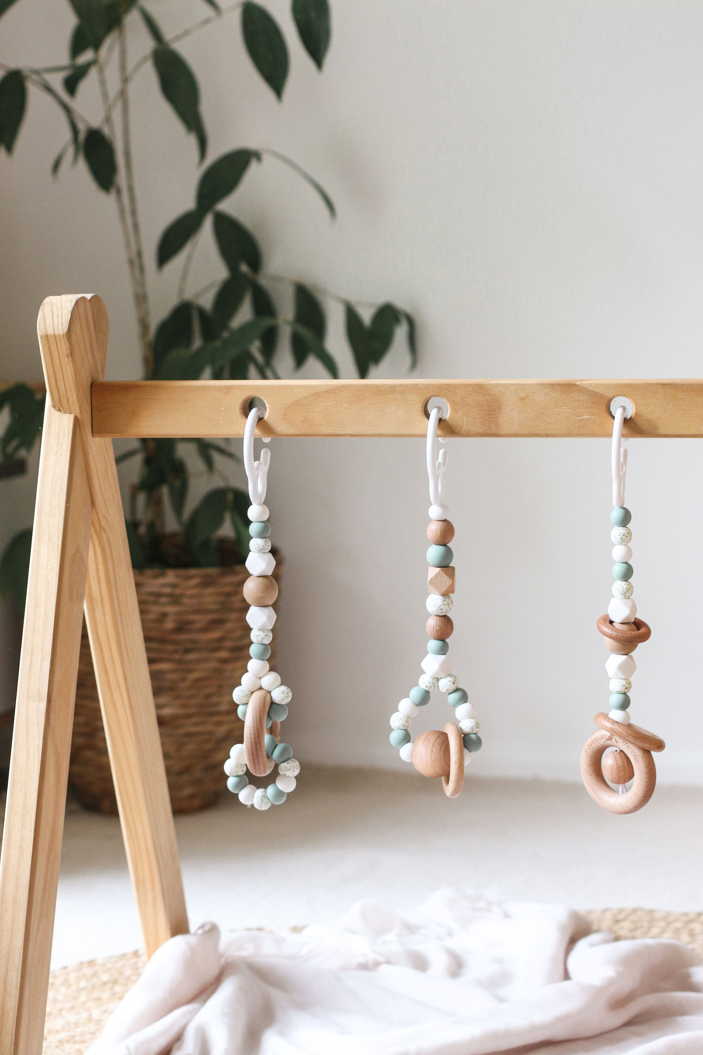 Timber/silicone play gym toys, handmade, certified safe - sage