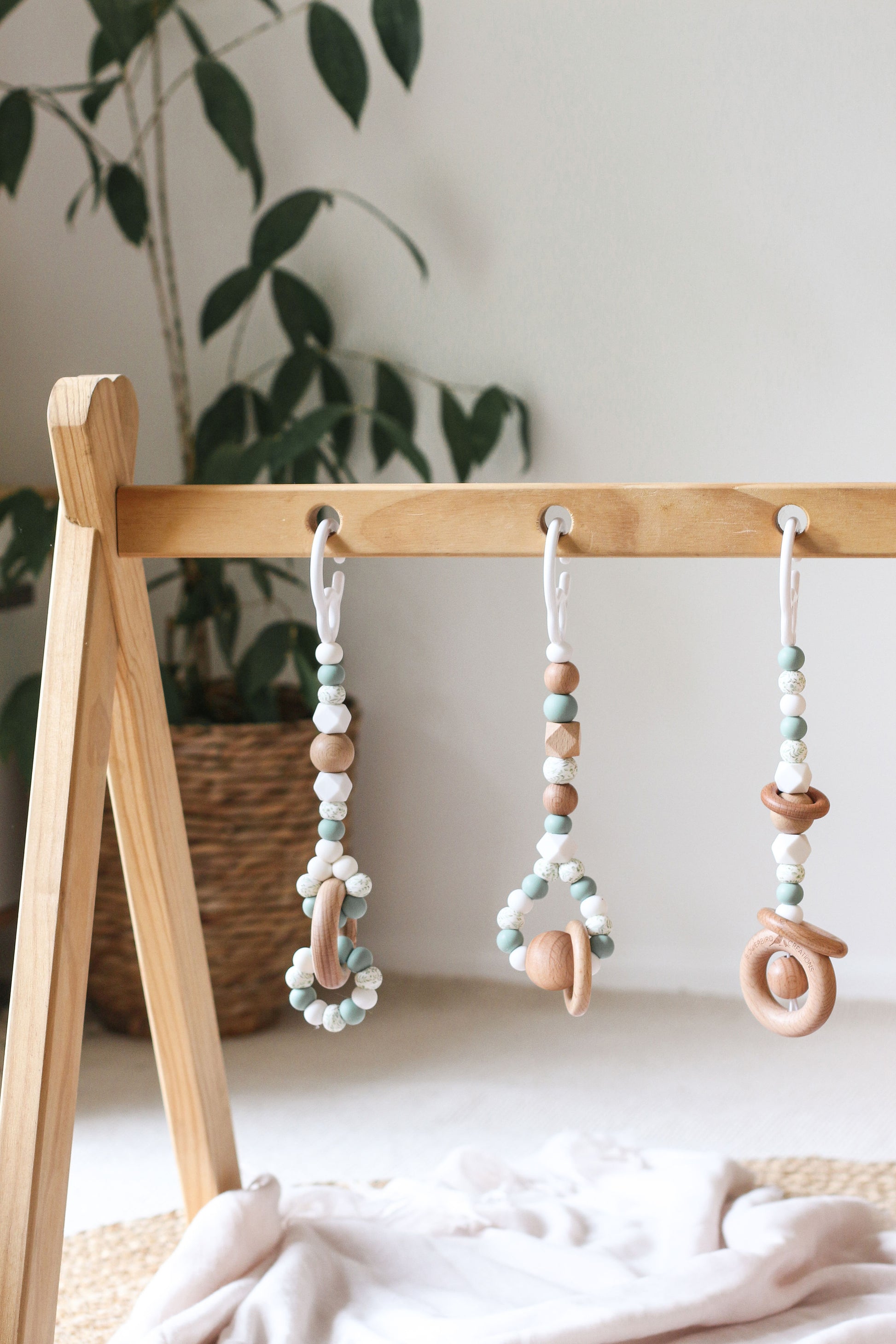 Timber/silicone play gym toys, handmade, certified safe - sage