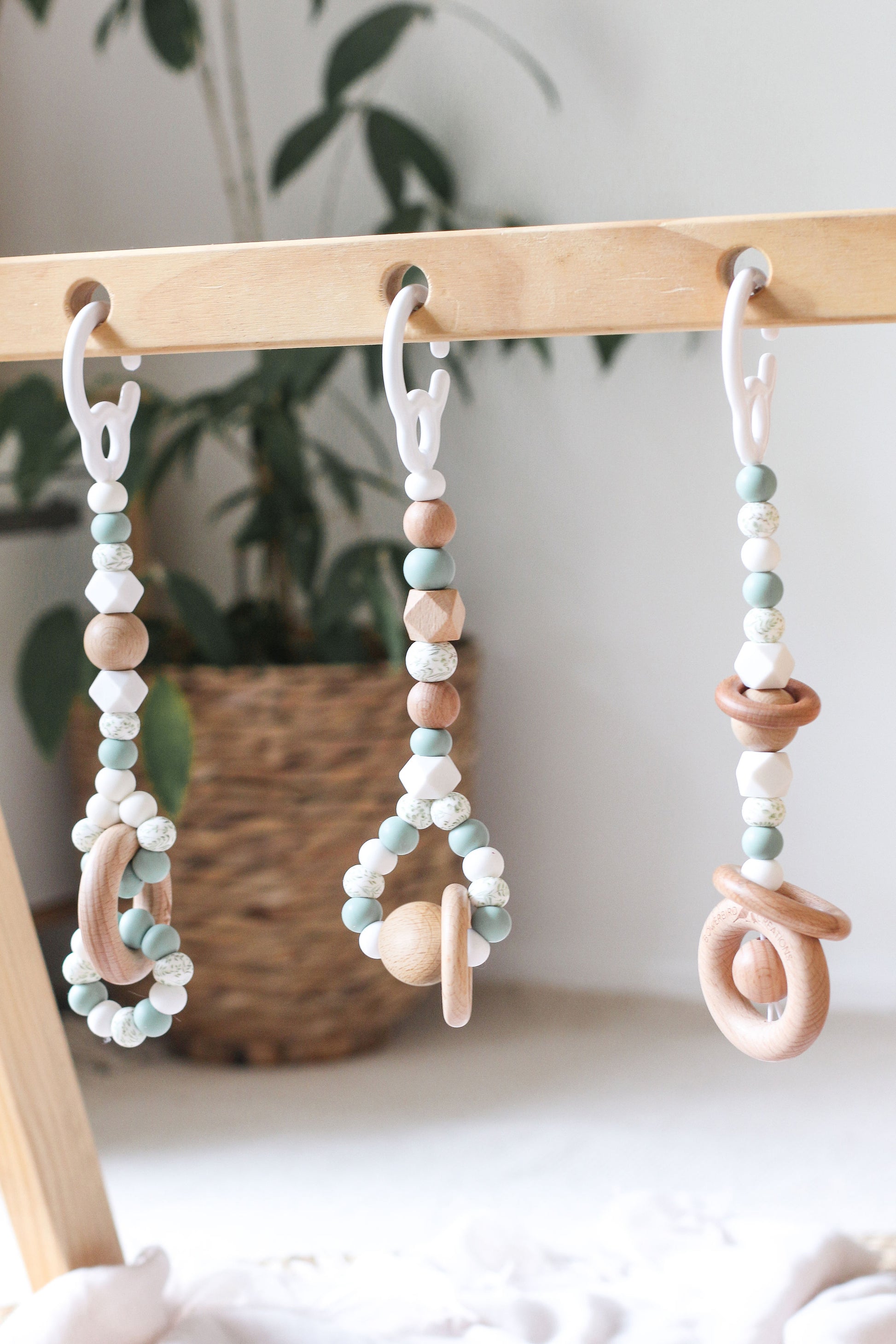 Timber/silicone play gym toys, handmade, certified safe - sage