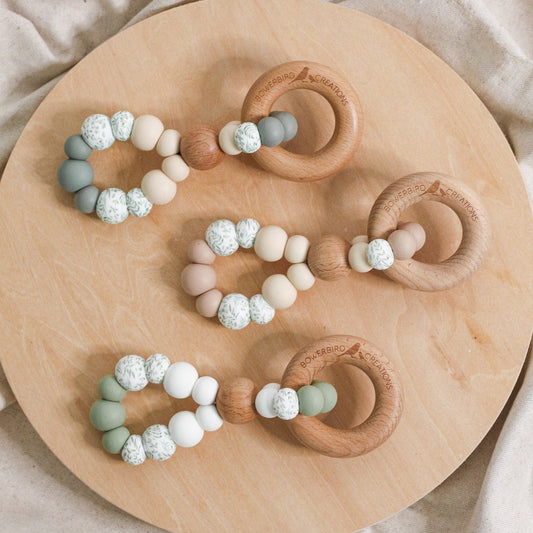 Teething toys infinity. Handmade from silicone and beech wood by Bowerbird Creations. Made in Australia. Beige, Sage, Eucalyptus. 