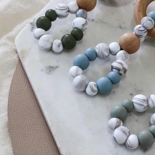 Teething toys infinity by Bowerbird Creations. Handmade from silicone and beech wood timber teething ring. Made in Australia. Marble and Sage.