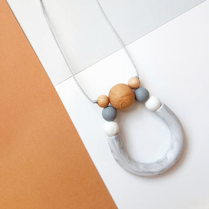 Created using a marble U tube especially for the modern woman. Featuring three Beech timber beads to make a beautiful statement necklace which also gives off the very softest 'rattle' sound when worn - Freya Ladies Necklace - Bowerbird Creations