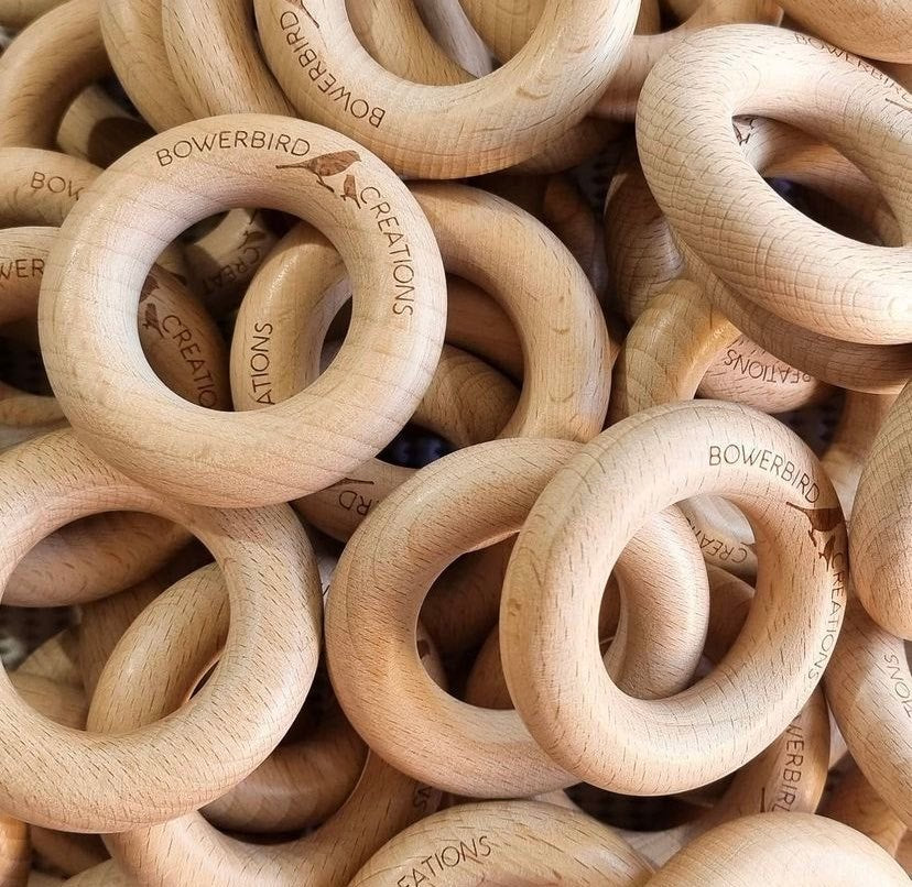 Natural beech timber rings for teething babies polished with organic beeswax and olive oil or coconut oil.
