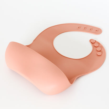 Silicone bib for baby. Pink.