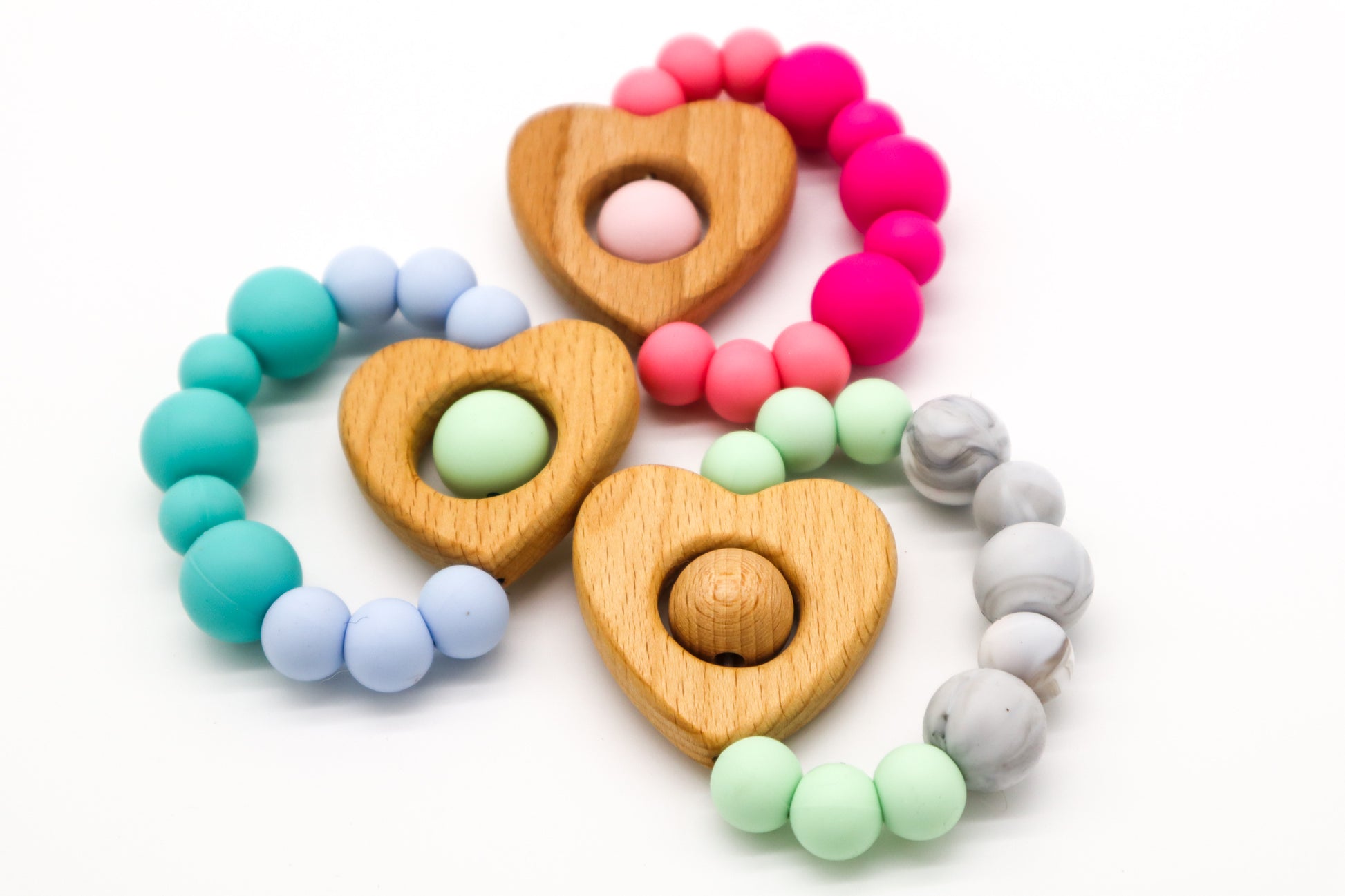 Valentino Teething Toy blue, pink, mint. Silicone and timber teether for babies