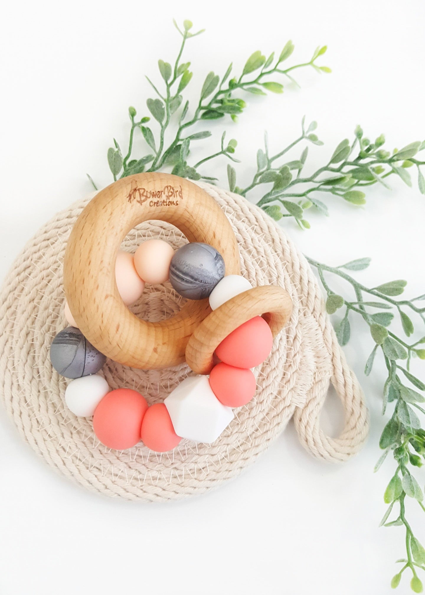 Made from gorgeous Beech timber and soft Bpa-free silicone, these teething toys have been designed to soothe sore teething gums and encourage healthy fine motor skills development and brain function - Eclipse Teething Toy - Bowerbird Creations