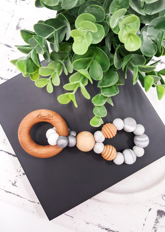 An exclusive and original design to BowerBird Creations! Created with soft silicone paired with a gorgeous Beech timber Bead and Ring - Infinity Silver Teething Toy - Bowerbird Creations