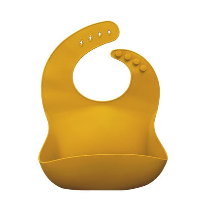 Silicone bib for baby. Mustard.