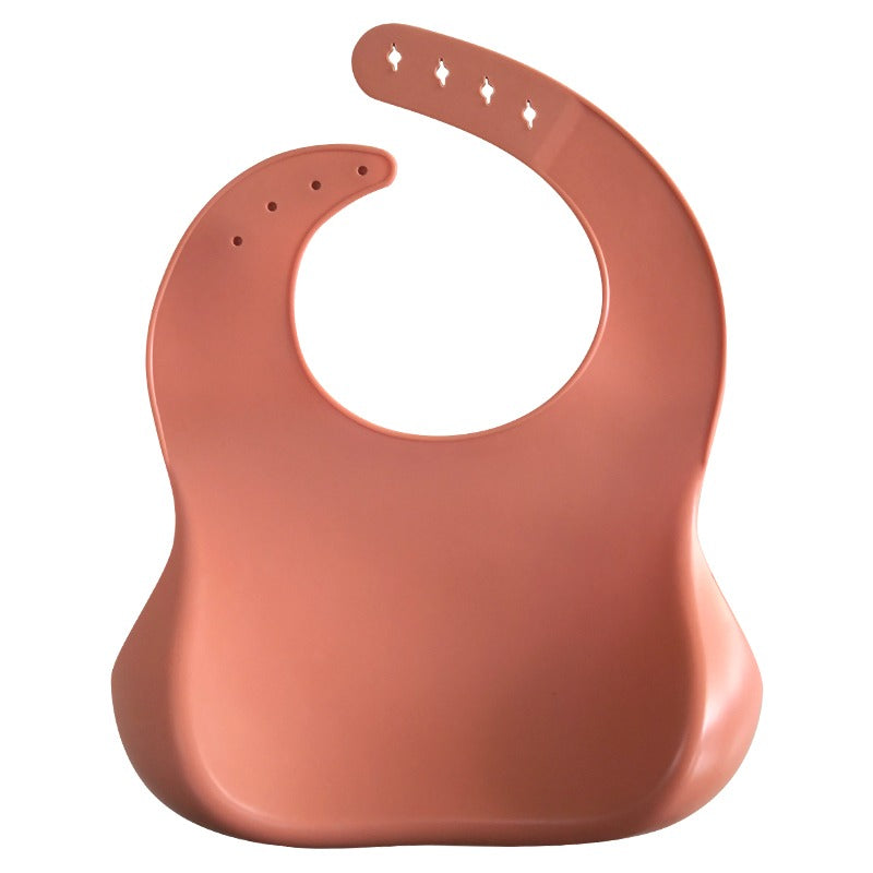 Silicone bib for baby. Brown.